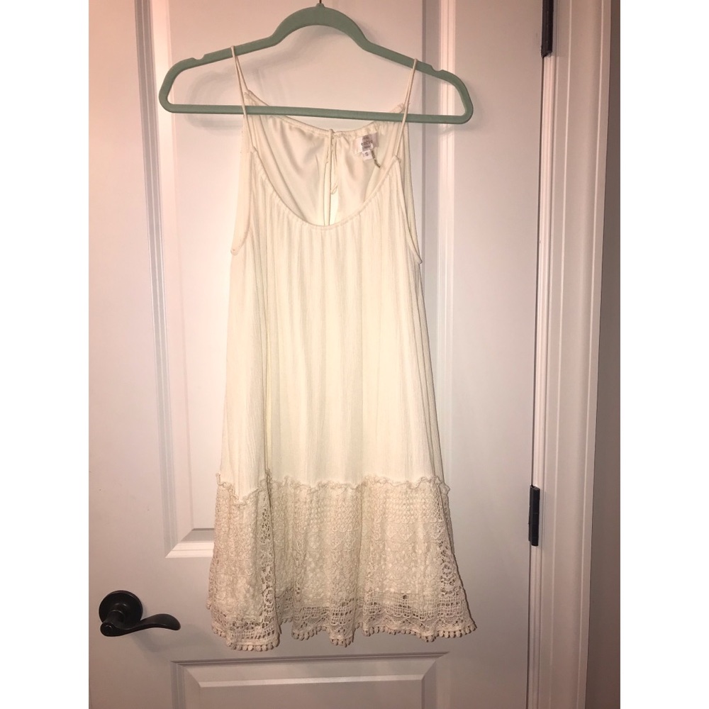 Cream sleeveless dress with crochet detailing